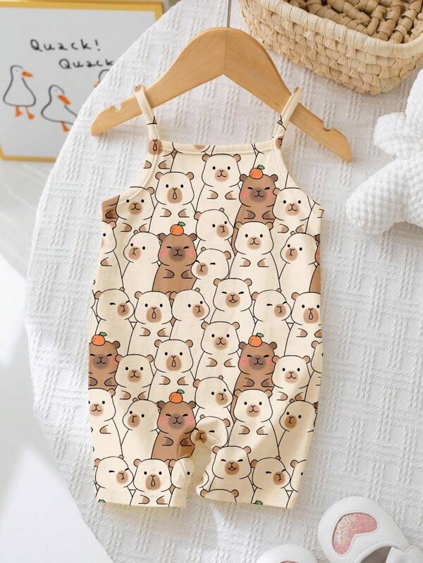 SHEIN Mameluco informal de tirantes con estampado de capibara y crema de almendras, adecuado para primavera/verano, verano fresco, hogar casual, gateo, exterior, picnic y viaje, para niñas pequeñas