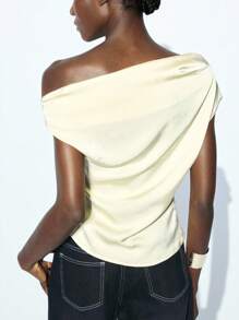 Maija Women Solid Color Ruched Asymmetrical Neck Metal Decor Fashionable Blouse Asymmetrical Neck Top Pale Yellow Top Asymmetrical Top Butter Yellow Top Top Going Out Tops Sexy For Women Concert For Women Airport Women Teacher Tops For Going Out Business Casual Woman Going Out Tops Women Going Out Tops Going Out Tops For Going Out Birthday For Women Birthday For Women Club Women Sexy Halloween