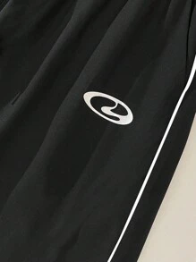 Manfinity Sport Corelite 男士梭织长款运动裤，腰部抽绳，时尚字母图案，黑白健身裤，宽松健身服，男士运动裤，运动裤 - 黑色 - 查看 3