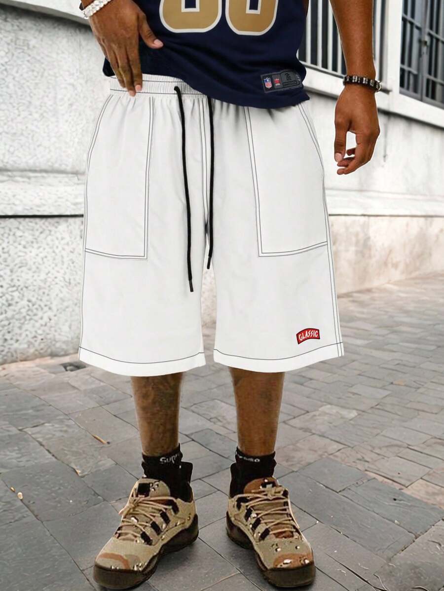 Manfinity EMRG Quần short nam dáng rộng, cạp chun, in chữ, quần short thường ngày, quần short oversize, quần short hàng hóa màu trắng cho nam - trắng - Xem 1