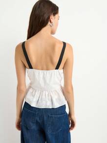 Nöista 这款白色荷叶边吊带背心，优雅又不失女性魅力，黑色荷叶边和蝴蝶结装饰更添亮点。无论是返校节、派对，还是作为秋季时尚女装，都是理想之选——无论是开学季还是约会之夜，都能让你成为众人瞩目的焦点。 - 白色 - 查看 2