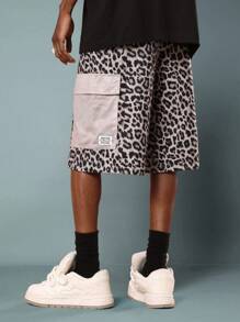 SUMWON Short à large jambe imprimé animal avec poches en mesh. Pantalon cargo ample style utilitaire pour le skateboard, la mode urbaine, les festivals, les concerts et les soirées - Multicolore - Voir 4