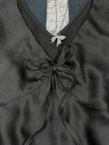 INAWLY Blusa sin mangas casual de mujer con cuello en V y lazo delantero de unicolor - Negro - Ver 3
