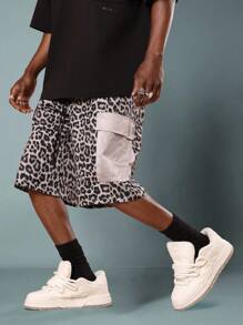 SUMWON Short à large jambe imprimé animal avec poches en mesh. Pantalon cargo ample style utilitaire pour le skateboard, la mode urbaine, les festivals, les concerts et les soirées - Multicolore - Voir 1