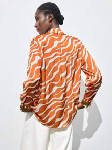 Maija 女士多色动物斑马纹印花橙色时尚度假纽扣衬衫，四季皆宜，轻盈的撞色印花长袖衬衫，休闲上衣，适合秋季、圣诞节、圣帕特里克节、复活节、夏季、海滩度假等各种场合。 - 彩色 - 查看 2