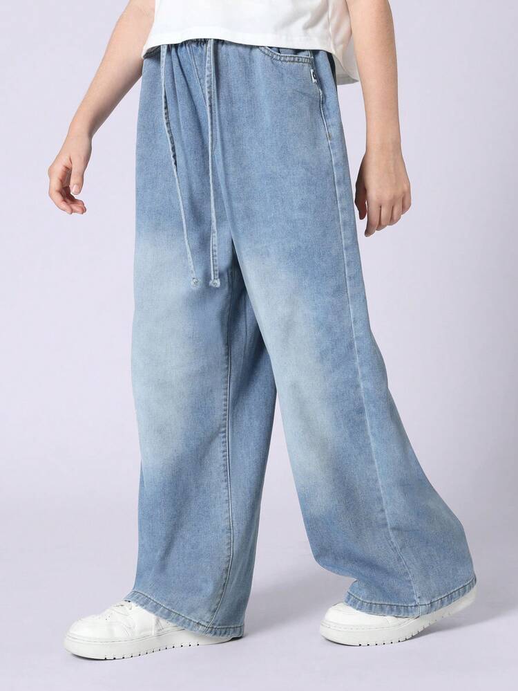 Jeans a gamba larga con coulisse in vita