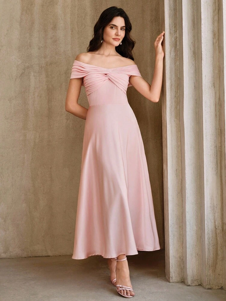 Robe rose élégante et sexy avec nœud et épaules dénudées, convient pour le mariage et la remise des diplômes