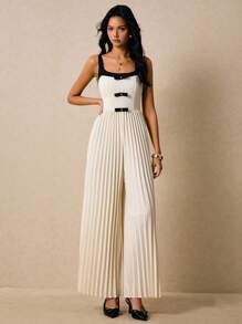 Poéselle Damen Jumpsuit mit Schleifendekor und weitem Bein - Schwarz und Weiss - Übersicht 5