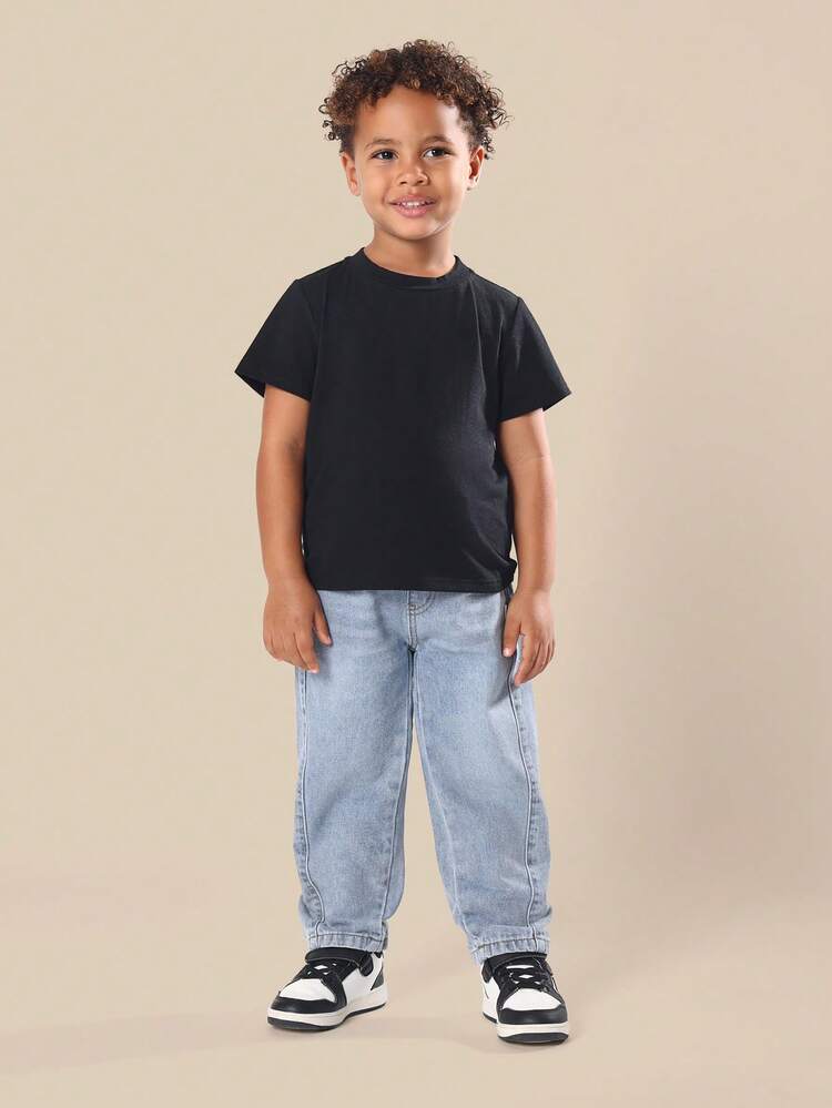 Luźne dżinsy z elastycznymi mankietami przy kostce