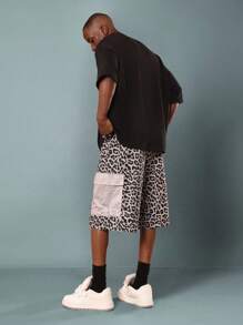 SUMWON Short à large jambe imprimé animal avec poches en mesh. Pantalon cargo ample style utilitaire pour le skateboard, la mode urbaine, les festivals, les concerts et les soirées - Multicolore - Voir 5