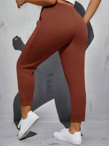 SHEIN Essnce 大码纯色口袋扭纹弹力紧身裤