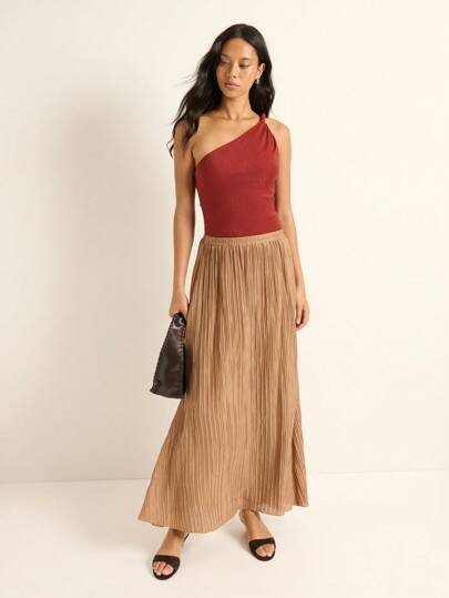 Nöista This Brown Pleated Maxi Skirt Is Made For Autumn Clothes, Fall Women Clothes, And Cozy Winter Outfits For Women. The Flowy, Crinkle Texture Brings Boho Vibes To Teacher Outfits Or Business Casual Women Who Want A Comfy-Chic Seasonal Look.