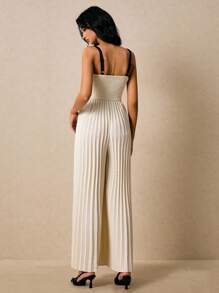 Poéselle Damen Jumpsuit mit Schleifendekor und weitem Bein - Schwarz und Weiss - Übersicht 2