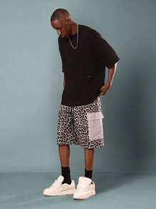 SUMWON Short à large jambe imprimé animal avec poches en mesh. Pantalon cargo ample style utilitaire pour le skateboard, la mode urbaine, les festivals, les concerts et les soirées - Multicolore - Voir 2