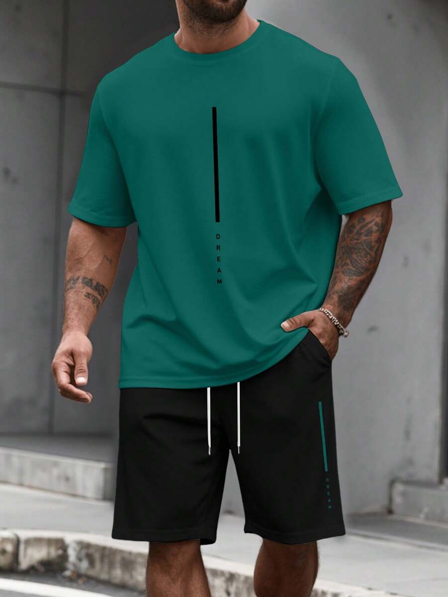 Manfinity Homme Bộ áo phông cổ tròn tay ngắn in chữ cỡ lớn kèm quần short cạp rút cho nam - Nhiều màu - Xem 1