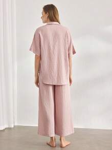 Ocili Conjunto de ropa de dormir de lino natural para mujer con cuello, botones al frente, manga 3/4 y pantalones a media pierna con rayas, cómodo