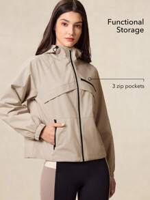 OutZeal Damen wasserabweisende, farblich abgesetzte Jacke mit Reißverschlusstaschen und Kapuze für Outdoor, Wandern, Camping