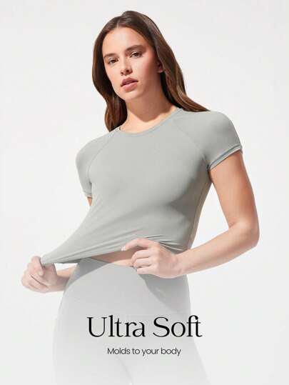 GLOWMODE Camiseta curta de manga curta Glow Era, de ajuste slim, de pescoço redondo, elástica e macia, para atividades, ioga, pilates, academia, estúdio e uso casual diário