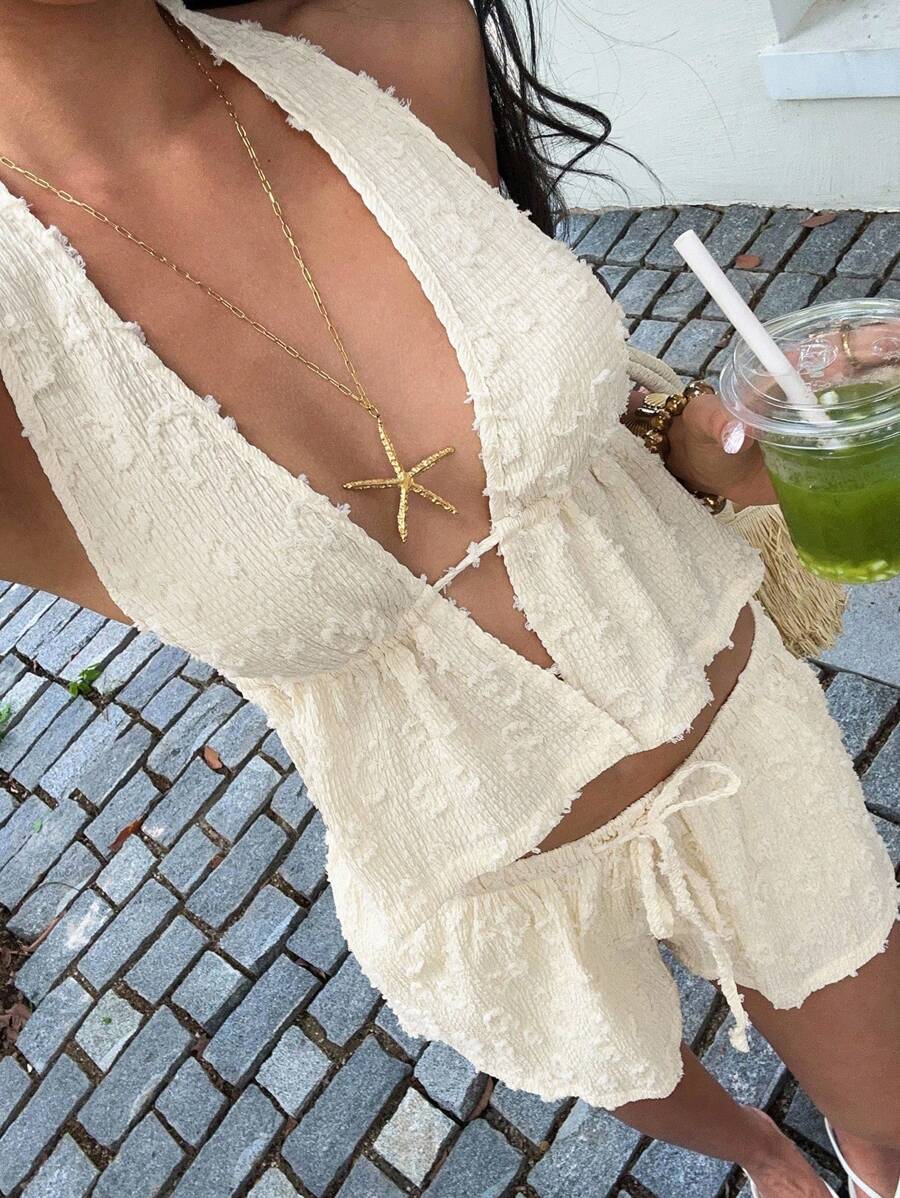 Sunnyshic 女式夏季黄色提花豹纹深 V 露背短款上衣和低腰抽绳宽松短裤两件套，度假海滩性感优雅休闲家居服 - 杏色 - 查看 1