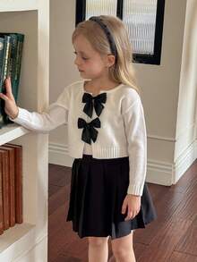 SHEIN 小女孩圆领蝴蝶结开衫，休闲日常穿着，秋冬季，长袖上衣，优雅可爱，高品质，温暖柔软，多功能，适合玩耍、日常穿着、学校、秋冬季，搭配白衬衫，返校季节。学院风格，