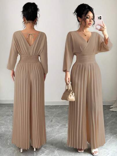 Selianne Enfärgad, elegant jumpsuit med v-ringning och fladdermusärm, veckad och vid ben, för kvinnor