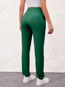 SHEIN Pantalones jogger de mujer de algodón con cordón y bolsillos