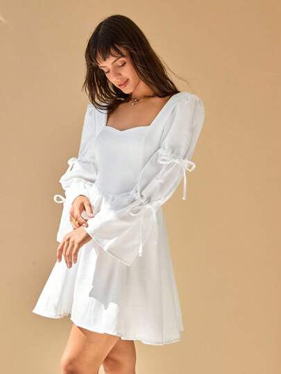 CLARA VERO Linen Mini Dress, Dramatic Puff Sleeve Design, Sweetheart Neckline, Tie Detail On Sleeves, Square Back Cut, Empire Waist Silhouette, Princess Style Fashion, Gathered Skirt Detail, Special Occasion Dress, Premium Linen Material, Vintage Inspired Design, Long Statement Sleeves, Romantic Fashion Piece, Event Ready Style, Modern Victorian Elements