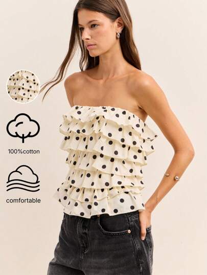 Nöista This Strapless Top Features Multiple Layered Ruffles In White Fabric With Black Polka Dots, Creating A Playful Vintage Vibe Perfect For Y2K-Inspired Streetwear During Fall And Winter Seasons.