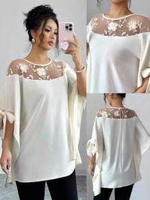 Selianne Blusa elegante francese a mantella con collo rotondo con spacchi e fiocco, in rete 3D floreale semi-trasparente, di colore albicocca, ampia e lusinghiera - Albicocca - Visualizzare 1