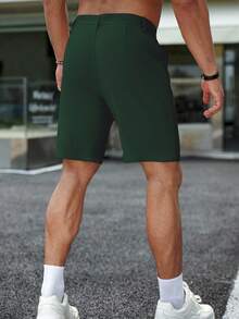 Manfinity Homme Men's Summer Casual Solid Color Waffle Texture Slant Pocket Shorts