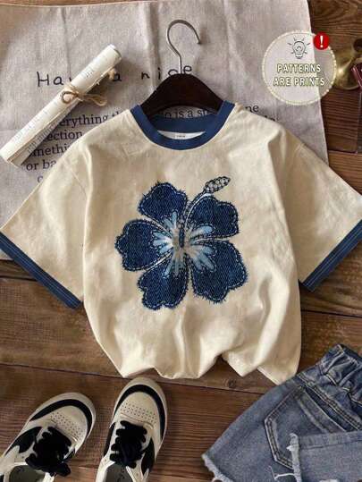 SHEIN EZwear Camiseta holgada de mujer de manga corta con cuello redondo, estampado floral azul minimalista y casual, adecuada para el verano