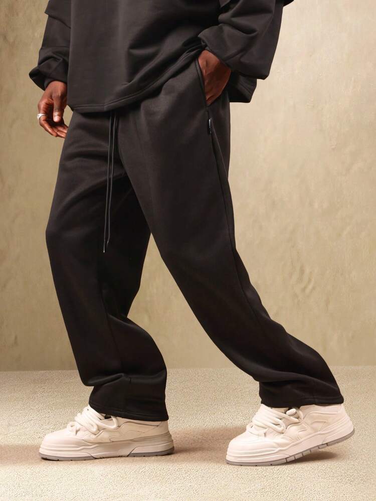 Pantaloni della tuta con cavallo basso, caviglie elastiche e coulisse