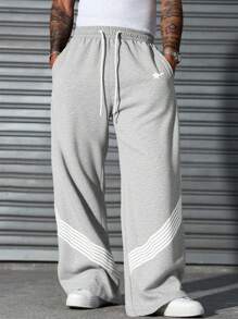 PAVTROS Manfinity Streetrush Streetrush Men's Casual Two-Tone Striped Wide Leg Pants, Men Grey Flared Sweatpants Grey Baggy Sweatpants Men Wide Leg Sweatpants Men Baggy Sweats Men Wide Leg Side Stripe Sweatpants, Hip-Hop Street, Boy Friend Gifts, Streetwear Men, Back To School, Fall