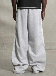PAVTROS Manfinity Streetrush Streetrush Men's Casual Two-Tone Striped Wide Leg Pants, Men Grey Flared Sweatpants Grey Baggy Sweatpants Men Wide Leg Sweatpants Men Baggy Sweats Men Wide Leg Side Stripe Sweatpants, Hip-Hop Street, Boy Friend Gifts, Streetwear Men, Back To School, Fall