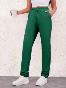 SHEIN Pantalones jogger de mujer de algodón con cordón y bolsillos
