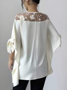 Selianne Blusa elegante francese a mantella con collo rotondo con spacchi e fiocco, in rete 3D floreale semi-trasparente, di colore albicocca, ampia e lusinghiera - Albicocca - Visualizzare 2