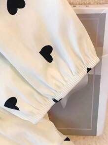 GlowEve CURVE Plus Size Heart Print Elastic Gathered Hem Round Neck Casual Shirt