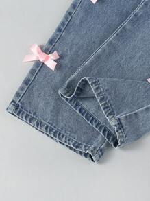 Jeans estilo Y2K para niñas preadolescentes, lavado azul medio vintage, decoración con lazo rosa, corte recto y suelto, tela suave y cómoda, y versátil, denim para niñas - Azul lavado medio - Ver 6