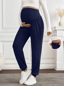 SHEIN Pantalones casuales de unicolor de talle alto para mujeres embarazadas, apropiados para el uso en primavera y verano
