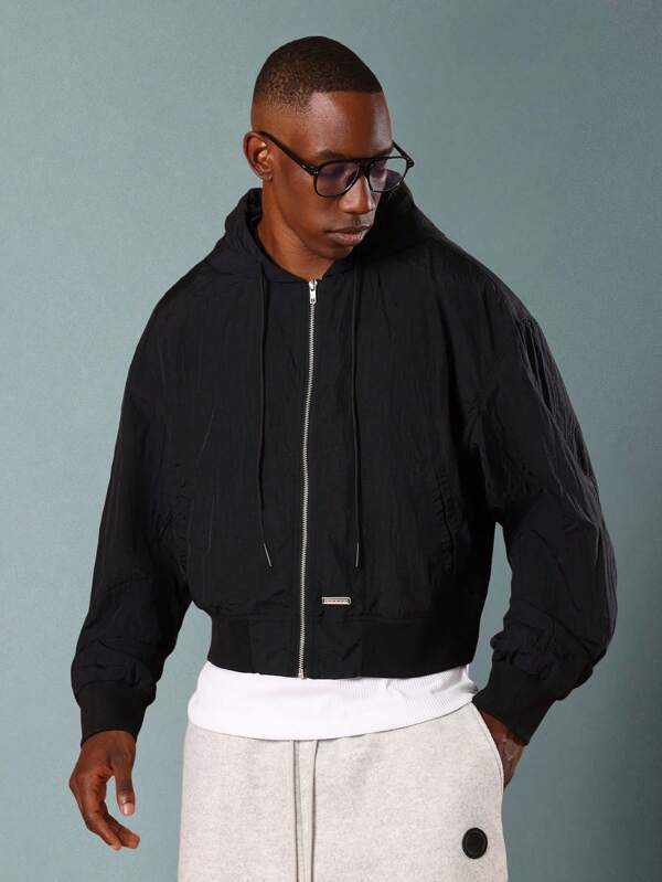 SUMWON Veste bomber essentielle avec capuche, fermeture éclair complète, cordon de serrage réglable, longueur courte, épaules oversize, vêtement d'extérieur décontracté classique pour l'hiver et l'automne
