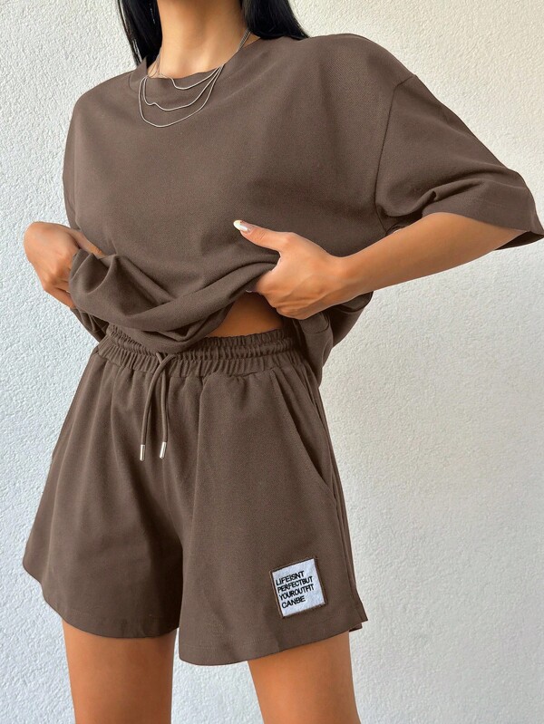 100% katoenen dames T-shirt in effen kleur en korte broek met borduurwerk