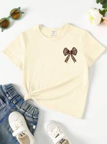 SHEIN Halloween Girls Toddler Yellow T-Shirt, Casual Fashion Creative Tic-Tac-Toe Leopard Plaid Bow Graphic Print Short Sleeve Tee, Holiday Casual Style Girls Bow Shirt Bow Shirt Girls Bows On Clothes Cute Bow Shirt Bow Clothes