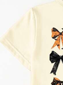 SHEIN Halloween Girls Toddler Yellow T-Shirt, Casual Fashion Creative Tic-Tac-Toe Leopard Plaid Bow Graphic Print Short Sleeve Tee, Holiday Casual Style Girls Bow Shirt Bow Shirt Girls Bows On Clothes Cute Bow Shirt Bow Clothes