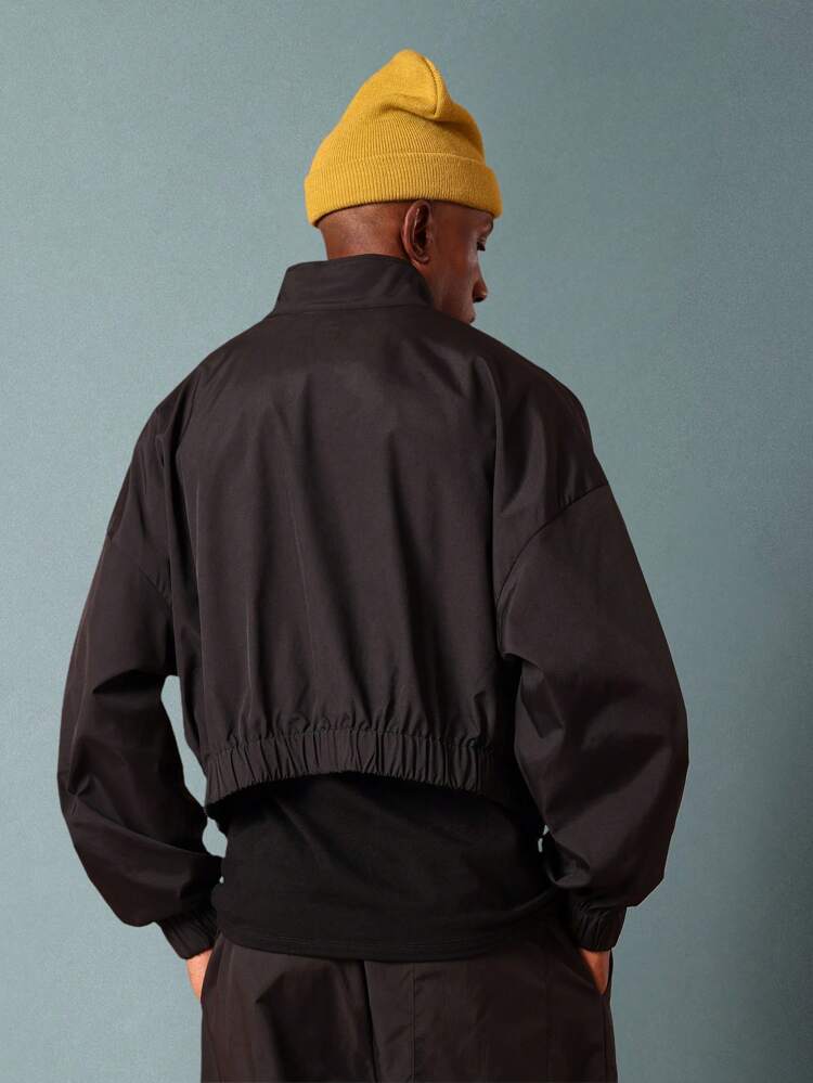 High Neck Windbreaker With Elasticated Waist And Cuffs