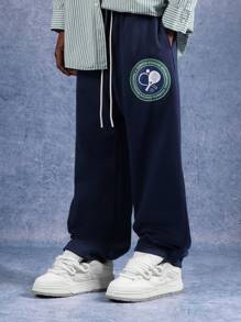 Pantaloni della tuta con cavallo basso SUMWON, con stemma ricamato del club di tennis, vestibilità morbida e rilassata, con coulisse ed elastico in vita, pesanti e confortevoli, adatti per l'abbigliamento casual in inverno, autunno e primavera, tinta unita - Blu Navy - Visualizzare 3