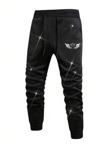Manfinity Homme Men's Shiny Black Sweatpants With Wing & Crown Pattern - Black - View 1