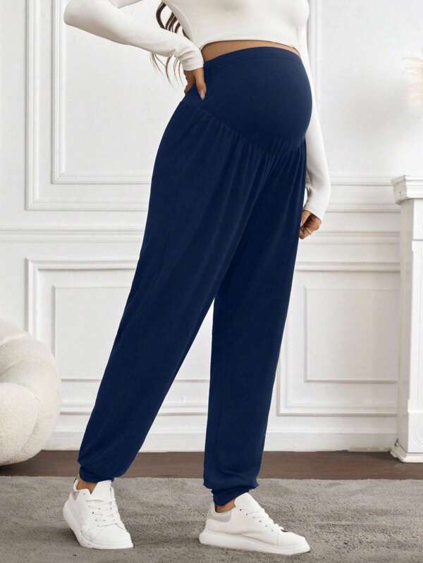 SHEIN Pantalones casuales de unicolor de talle alto para mujeres embarazadas, apropiados para el uso en primavera y verano