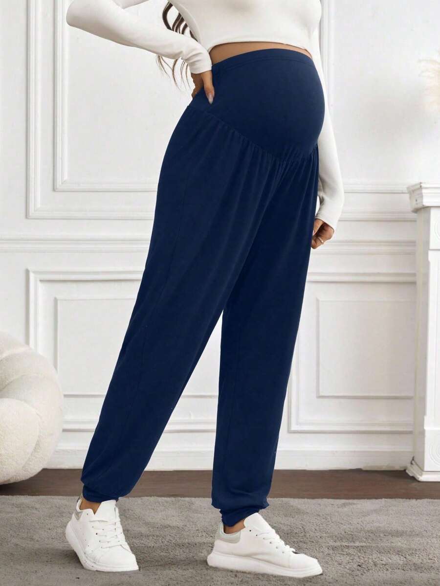 SHEIN Pantalones casuales de unicolor de talle alto para mujeres embarazadas, apropiados para el uso en primavera y verano