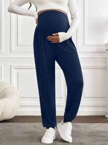 SHEIN Pantalones casuales de unicolor de talle alto para mujeres embarazadas, apropiados para el uso en primavera y verano