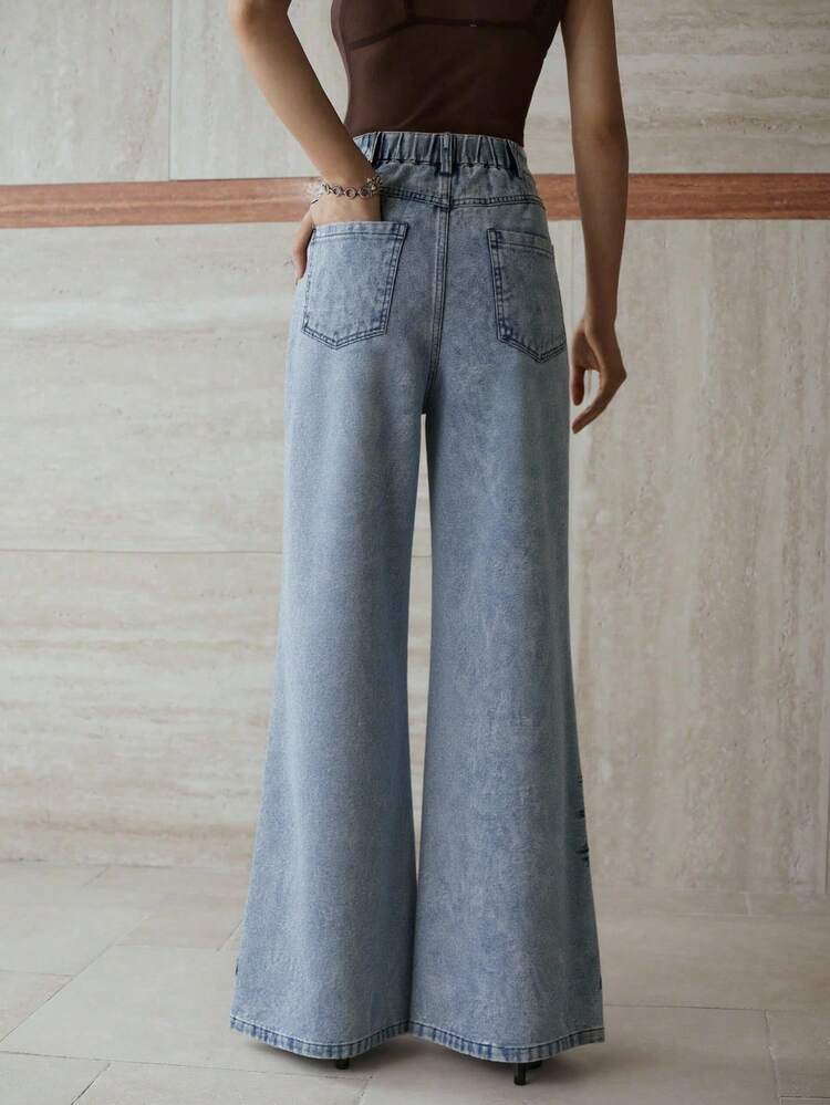 EMBROIDERY FLORAL PATTERN FLARE LEG JEANS